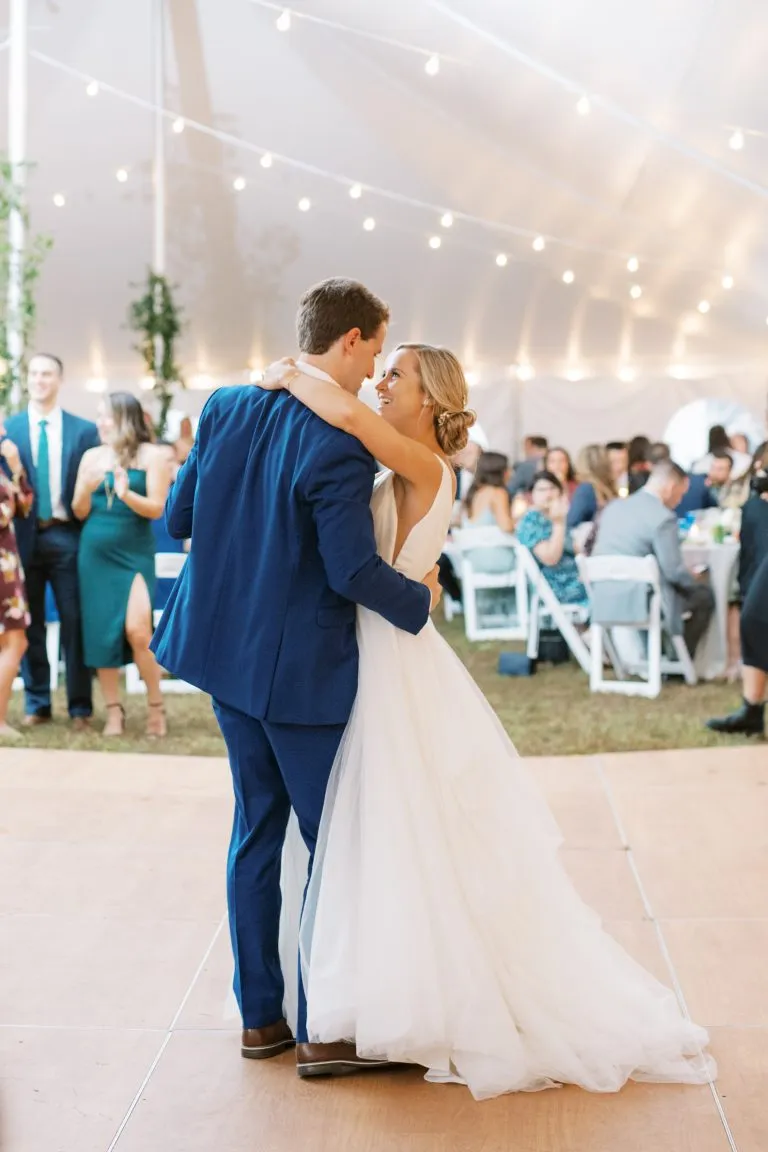 Bride and Groom First Dance at Outdoor Tent Wedding