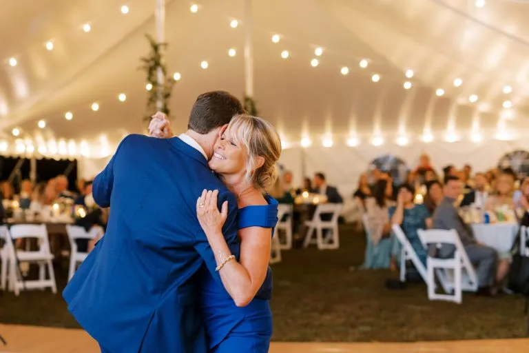 Mother and Son Dance Under A Beautiful Wedding Tent