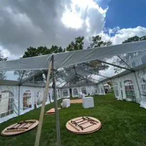 Does tent rental include setup — clear top frame tent installed by Dreamers Event Rentals crew in Maryland