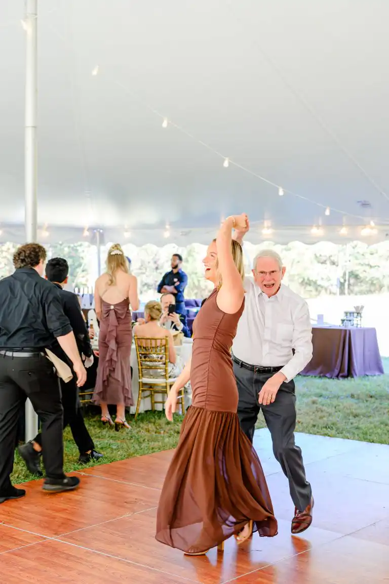 Wedding tent decor trends 2026 Maryland bistro lights reception