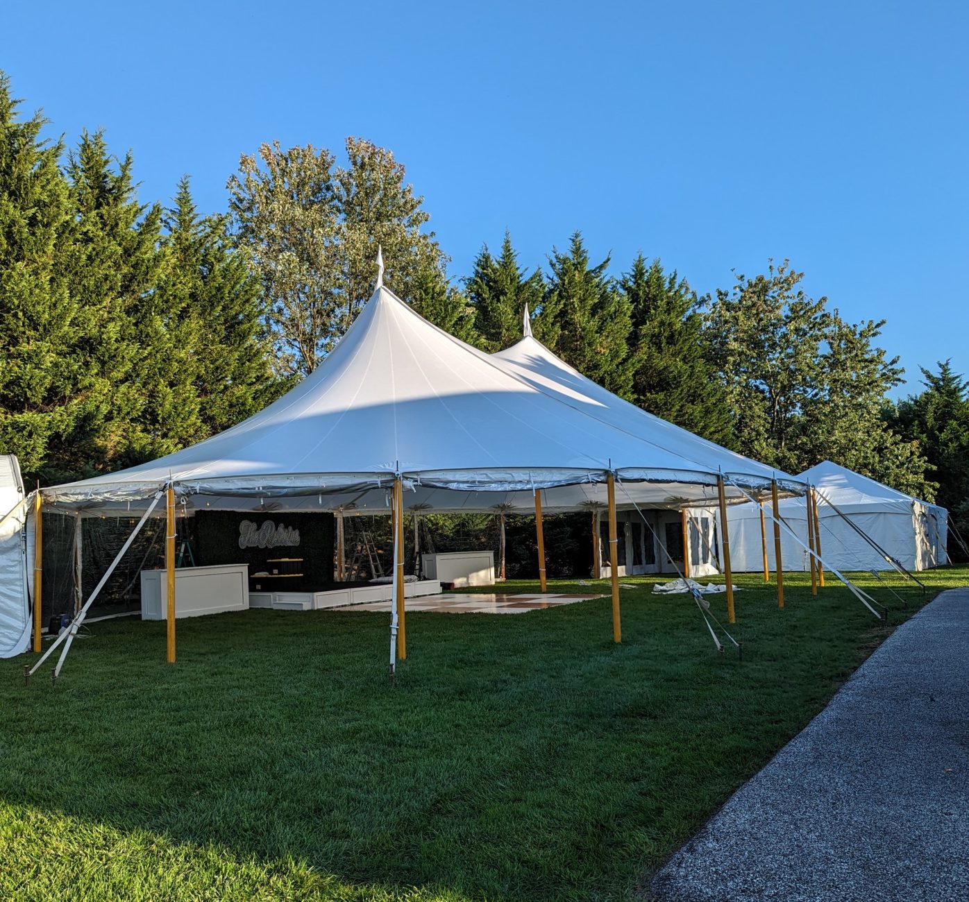 Sailcloth tent rental set up for an outdoor wedding in Maryland